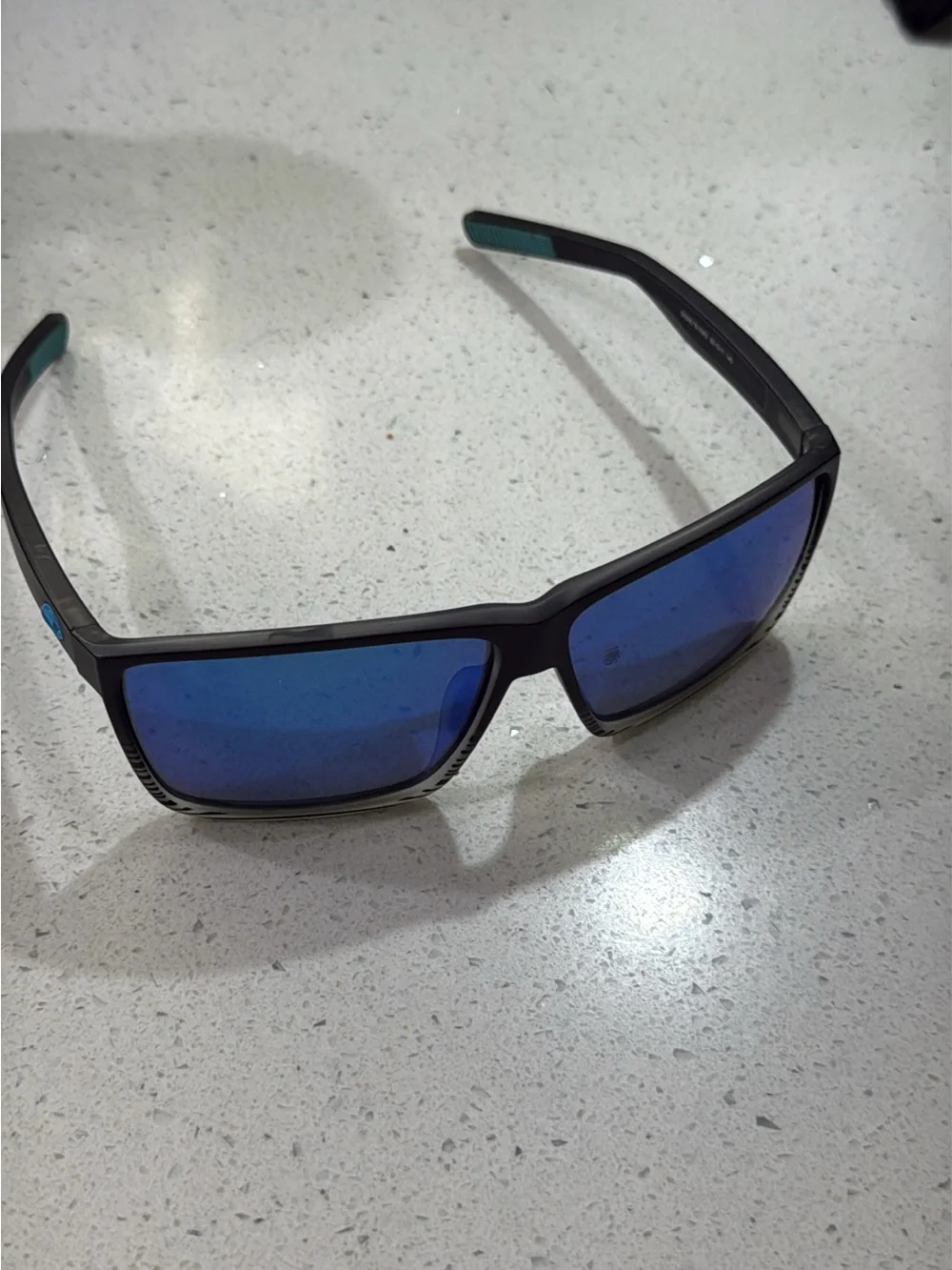 Costa Sunglasses Black Frame with Blue Mirrored Lenses